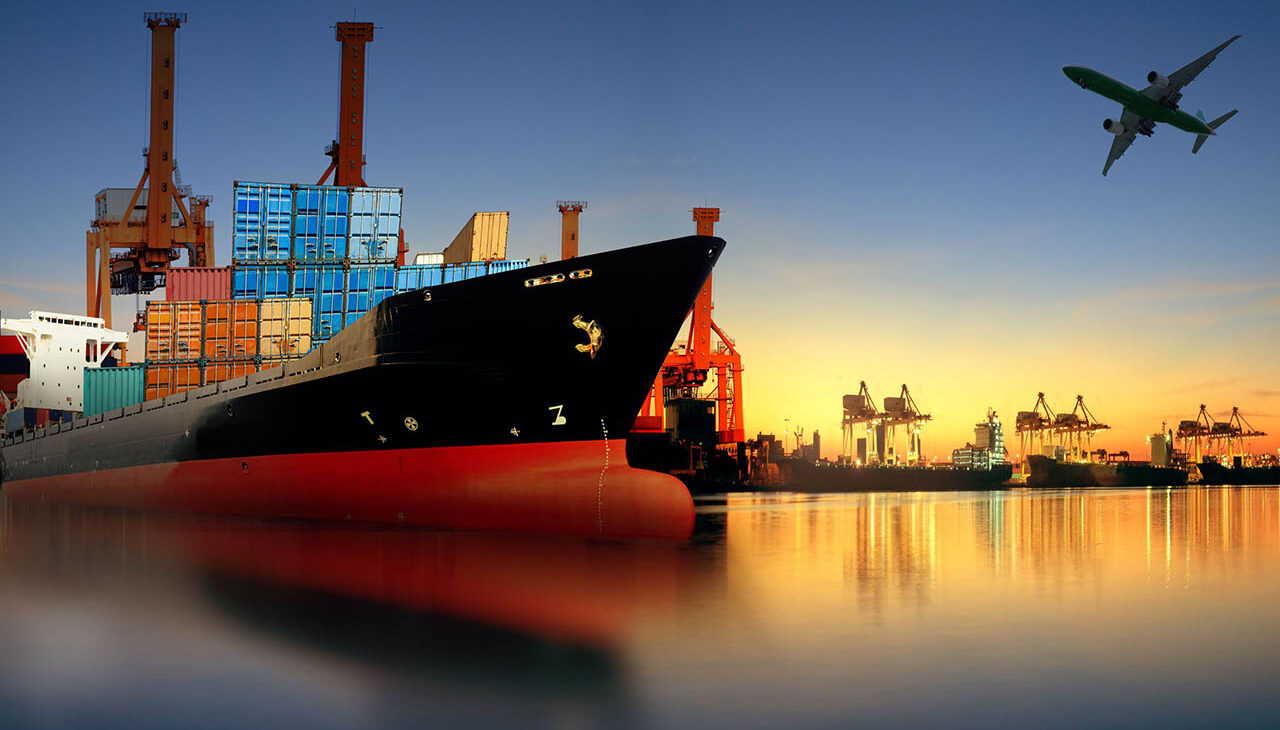 44177182 - container ship in import,export port against beautiful morning light of loading ship yard use for freight and cargo shipping vessel transport